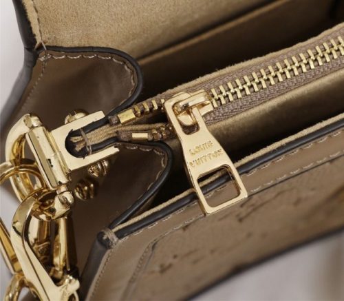 Louis Vuitton Monogram Empreinte Dauphine Bag In Brown - Image 4