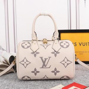 Louis Vuitton Bicolor Monogram Empreinte Leather Speedy Bandouliere 25 Handbag In Cream And Bois De Rose Pink