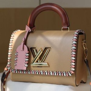 Louis Vuitton Epi Leather Twist MM Bag In Beige With Braided Edges Flap