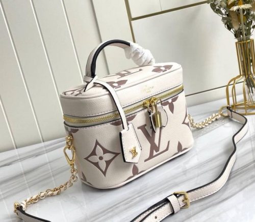 Louis Vuitton Bicolor Monogram Empreinte Vanity PM Bag In Cream And Bois De Rose Pink - Image 2